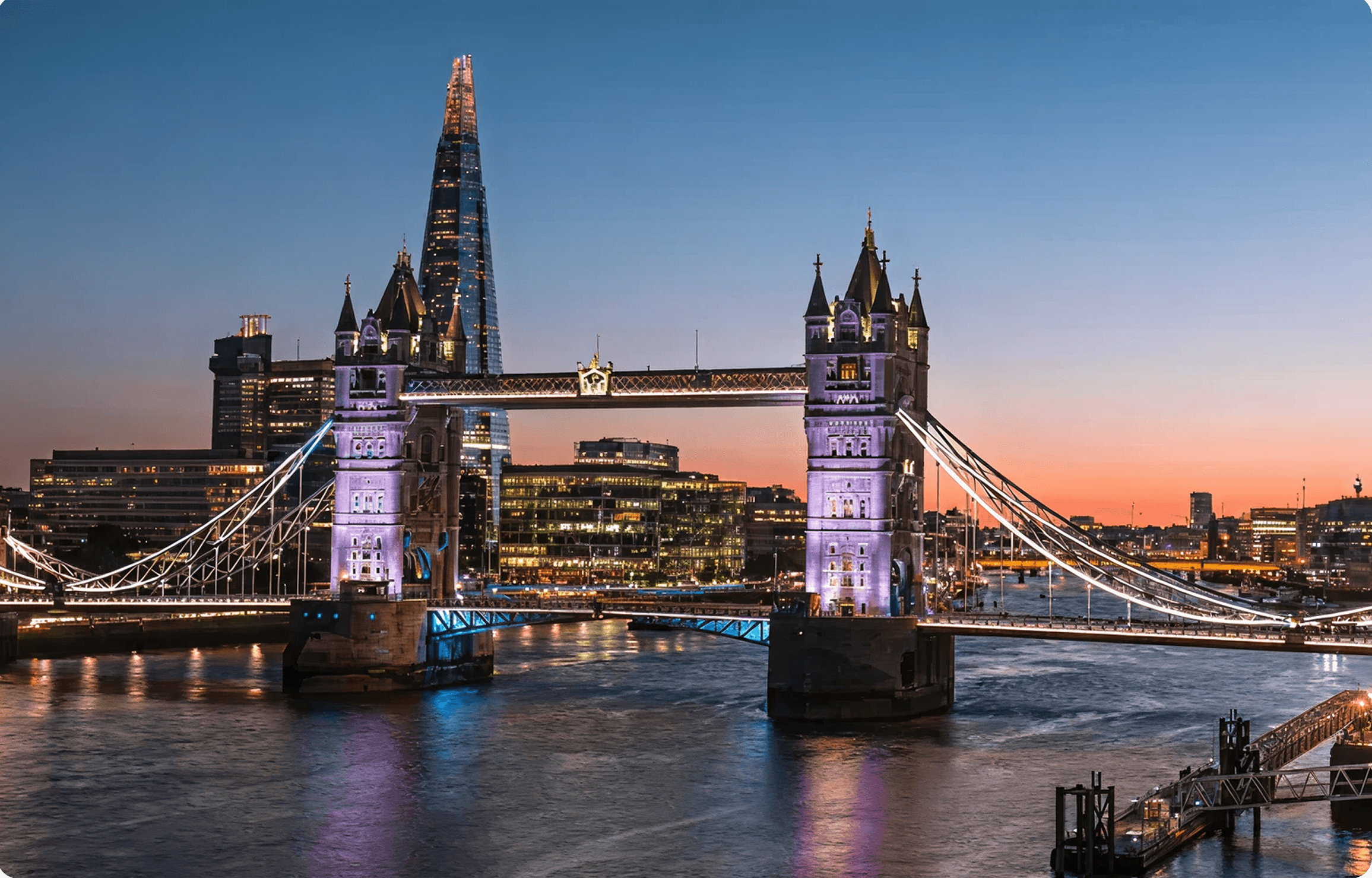 Professional London chauffeur service with Tower Bridge at sunset